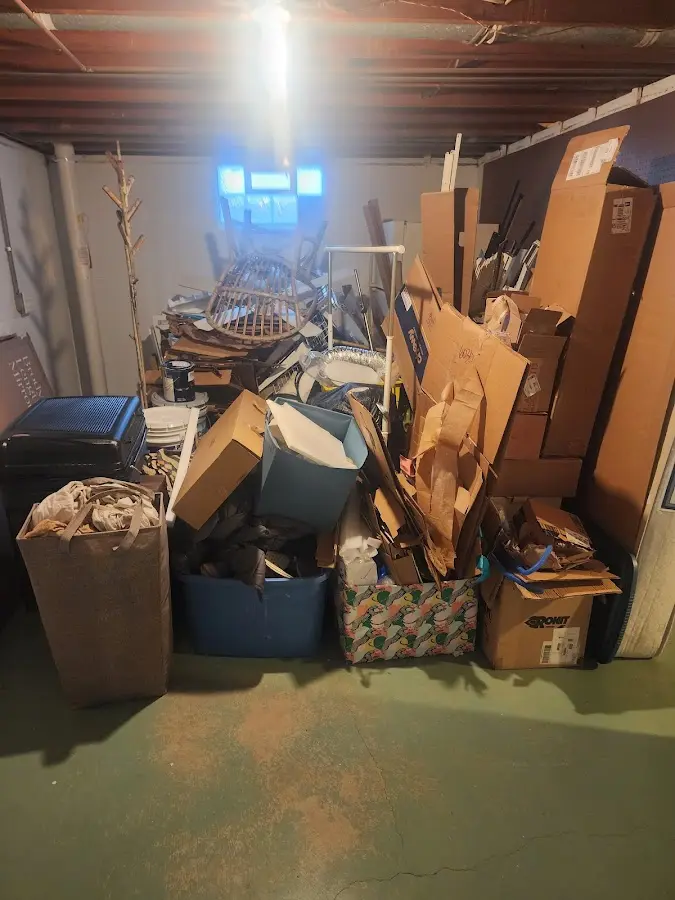 Roll-off dumpster container at job site for Construction Dumpster Rental in Mehlville